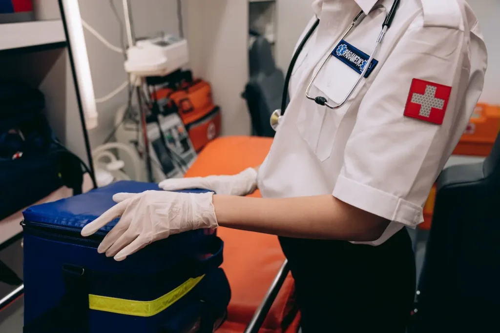 EMT in an ambulance for the article about what to do if workers' comp medical costs aren't covered.