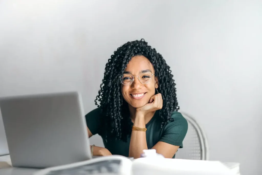 Picture of a woman smiling after learning how to file a personal injury claim in North Carolina.